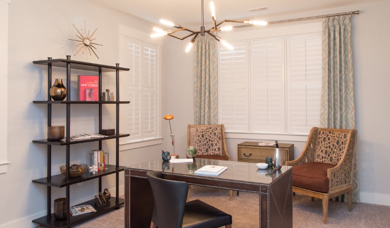 Bluff City home office with plantation shutters.